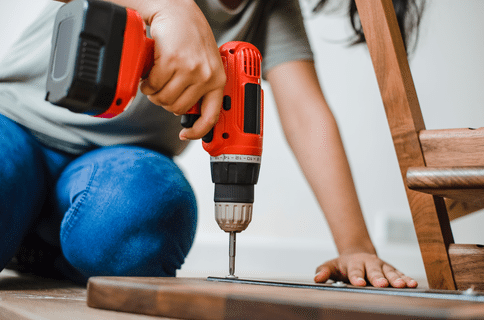 Man Using Tools - 3 Must-Have Tools for Every Homeowner